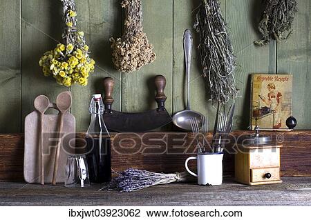 Rustic kitchen still life with kitchen utensils and dried herbs View Large Photo Image Stock Image - Rustic kitchen still life with kitchen utensils and dried herbs. Fotosearch
