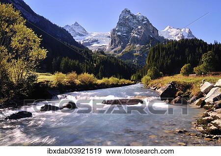 Stock Photo - "Rychenbach at Rosenlaui, behind Rosenlaui Glacierwith Dossen, Rosenhorn, Wetterhorn, Meiringen, Canton of Bern, Switzerland, Europe". Fotosearch
