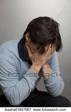 Stock Photo - "Sad man, sadness, depression". Fotosearch
