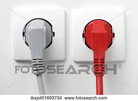 "Safety plugs, two poles, in outlet, power" View Large Photo Image Picture - "Safety plugs, two poles, in outlet, power". Fotosearch