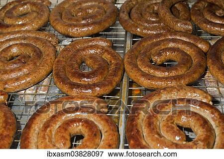 Stock Photo - "Sai Ua Chiang Mai, special sausages from Chiang Mai, on a grill, Chiang Mai, Thailand, Asia". Fotosearch