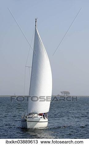 Stock Image - "Sailing boat on the Schlei river, Schleimunde, Schleswig-Holstein, Germany, Europe". Fotosearch