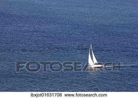 Stock Photo - Sailing boat on the sea. Fotosearch
