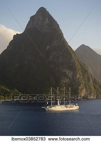 "Sailing cruise ship Wind Star of Windstar Cruises in front of the volcanoes Gros Piton and Petit Piton, Soufriere region, Saint Lucia, Windward Islands, Lesser Antilles, North America" View Large Photo Image Stock Image - "Sailing cruise ship Wind Star of Windstar Cruises in front of the volcanoes Gros Piton and Petit Piton, Soufriere region, Saint Lucia, Windward Islands, Lesser Antilles, North America". Fotosearch