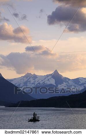 "Saint Mary's Glacier Lake with Wild Goose Island, Fusillade Mountain, Glacier National Park, Rocky Mountains, Montana, USA" View Large Photo Image Stock Image - "Saint Mary's Glacier Lake with Wild Goose Island, Fusillade Mountain, Glacier National Park, Rocky Mountains, Montana, USA". Fotosearch