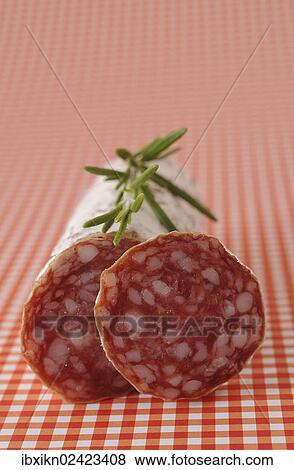 Salami on a chequered tablecloth View Large Photo Image Stock Photo - Salami on a chequered tablecloth. Fotosearch