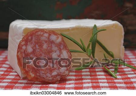 "Salami, soft cheese and a sprig of rosemary, Germany, Europe" View Large Photo Image Stock Photograph - "Salami, soft cheese and a sprig of rosemary, Germany, Europe". Fotosearch