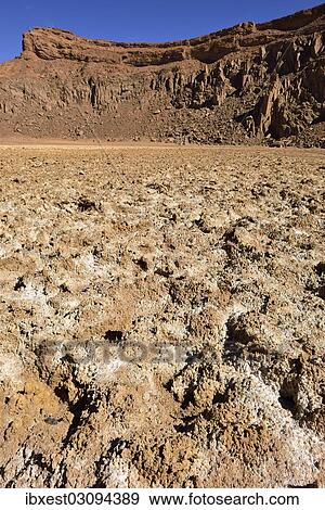 "Salt pan in the volcanic landscape of lower Ouksem crater, Menzaz, Tamanrasset Province, Algeria, Africa" View Large Photo Image Stock Photo - "Salt pan in the volcanic landscape of lower Ouksem crater, Menzaz, Tamanrasset Province, Algeria, Africa". Fotosearch