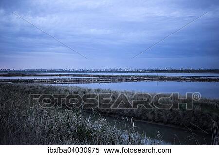"Saltworks at dusk at the port town of Burgas, Bulgaria, Europe" View Large Photo Image Stock Photography - "Saltworks at dusk at the port town of Burgas, Bulgaria, Europe". Fotosearch