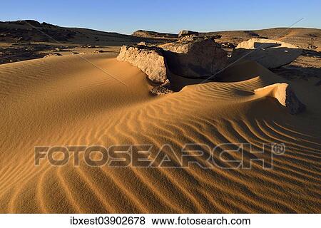 "Sand dunes and sandblasted rocks on Tadrart plateau, Tassili n'Ajjer National Park, Unesco World Heritage Site, Sahara, Algeria, Africa" View Large Photo Image Stock Photo - "Sand dunes and sandblasted rocks on Tadrart plateau, Tassili n'Ajjer National Park, Unesco World Heritage Site, Sahara, Algeria, Africa". Fotosearch