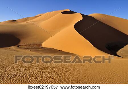 "Sand dunes at Erg Mehedjibat, Immidir, Algeria, Sahara, North Africa, Africa" View Large Photo Image Stock Photo - "Sand dunes at Erg Mehedjibat, Immidir, Algeria, Sahara, North Africa, Africa". Fotosearch