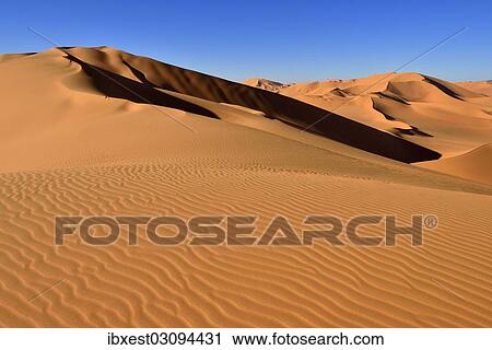 "Sand dunes at Erg Mehejibad, Sahara, Erg Mehejibad, Immidir or Mouydir, Sahara, Tamanrasset Province, Algeria, Africa" View Large Photo Image Stock Image - "Sand dunes at Erg Mehejibad, Sahara, Erg Mehejibad, Immidir or Mouydir, Sahara, Tamanrasset Province, Algeria, Africa". Fotosearch