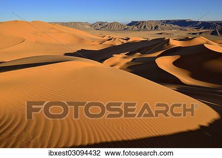 "Sand dunes at Erg Mehejibad, Sahara, Erg Mehejibad, Immidir or Mouydir, Sahara, Tamanrasset Province, Algeria, Africa" View Large Photo Image Stock Image - "Sand dunes at Erg Mehejibad, Sahara, Erg Mehejibad, Immidir or Mouydir, Sahara, Tamanrasset Province, Algeria, Africa". Fotosearch