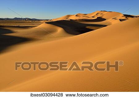 "Sand dunes at Erg Takaraft, Erg Takaraft, Immidir or Mouydir, Sahara, Tamanrasset Province, Algeria, Africa" View Large Photo Image Stock Photo - "Sand dunes at Erg Takaraft, Erg Takaraft, Immidir or Mouydir, Sahara, Tamanrasset Province, Algeria, Africa". Fotosearch