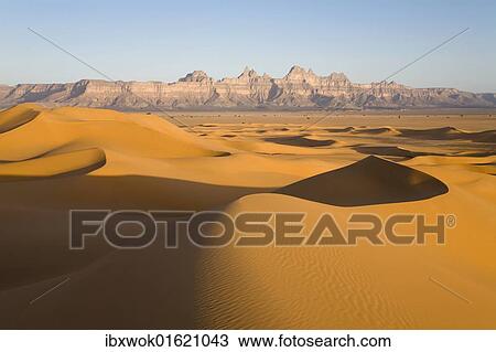 "Sand dunes in front of the Idinen Mountains in the Libyan Desert, Libya, Sahara, North Africa, Africa" View Large Photo Image Stock Image - "Sand dunes in front of the Idinen Mountains in the Libyan Desert, Libya, Sahara, North Africa, Africa". Fotosearch