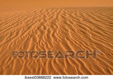 Stock Image - "Sand ripples, texture on a sand dune, Tassili n'Ajjer, Sahara desert, Algeria, Africa". Fotosearch
