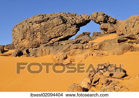 "Sandstone rock formation and sand dunes, Adrar Tekemberet, Immidir, Algeria, Sahara, North Africa, Africa" View Large Photo Image Picture - "Sandstone rock formation and sand dunes, Adrar Tekemberet, Immidir, Algeria, Sahara, North Africa, Africa". Fotosearch