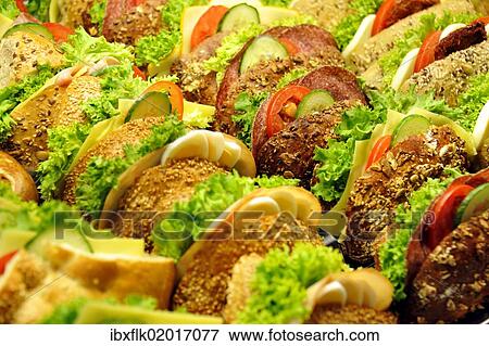 Sandwiches in a shop window View Large Photo Image Stock Photo - Sandwiches in a shop window. Fotosearch