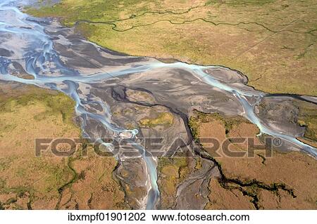 Stock Image - "Sandy plain with the glacial runoff of the Joekulsarlon glacier, aerial view, Iceland, Europe". Fotosearch