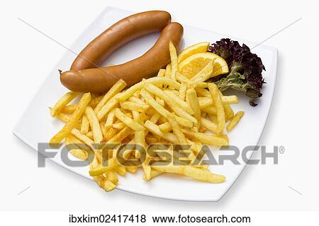 Sausage with french fries View Large Photo Image Stock Photo - Sausage with french fries. Fotosearch