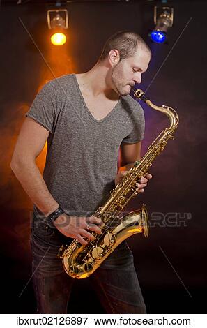 Saxophone player View Large Photo Image Stock Photo - Saxophone player. Fotosearch