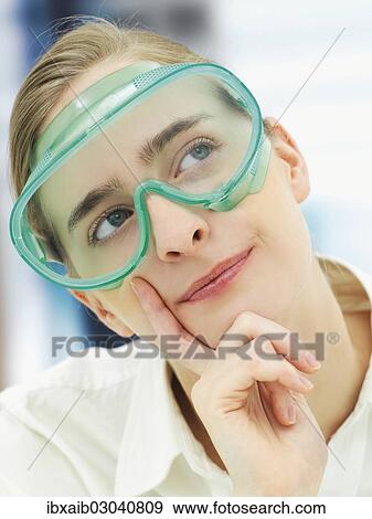 "Scientist wearing a protective mask, portrait" View Large Photo Image Stock Photo - "Scientist wearing a protective mask, portrait". Fotosearch
