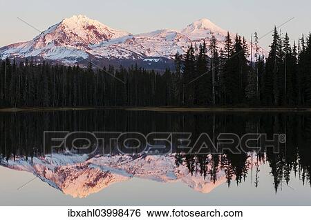 "Scott Lake with the Three Sisters, Cascade Range, Oregon, United States, North America" View Large Photo Image Stock Photograph - "Scott Lake with the Three Sisters, Cascade Range, Oregon, United States, North America". Fotosearch