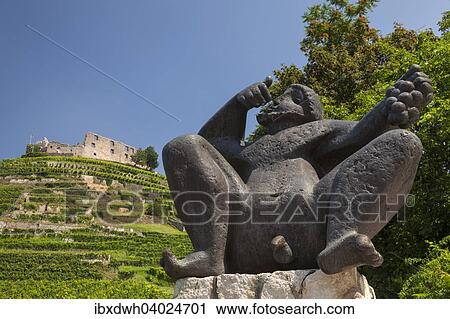 "Sculpture, Bacchus in front of the vineyard with Staufen castle, Staufen im Breisgau, Black Forest, Baden-Wurttemberg, Germany, Europe" View Large Photo Image Stock Image - "Sculpture, Bacchus in front of the vineyard with Staufen castle, Staufen im Breisgau, Black Forest, Baden-Wurttemberg, Germany, Europe". Fotosearch
