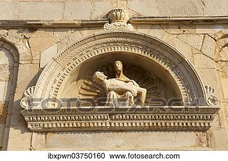 "Sculpture of Holy Mary holding the dead body of Christ, by Petar Trogiranin, 1514, above the door of the previous Cathedral of St Mary the Great, Rab Island, Primorje-Gorski Kotar County, Croatia, Europe" View Large Photo Image Stock Image - "Sculpture of Holy Mary holding the dead body of Christ, by Petar Trogiranin, 1514, above the door of the previous Cathedral of St Mary the Great, Rab Island, Primorje-Gorski Kotar County, Croatia, Europe". Fotosearch