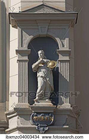 Picture - "Sculpture of Prudence, goddess of Wisdom, on the baroque town hall, Luneburg, Lower Saxony, Germany, Europe". Fotosearch