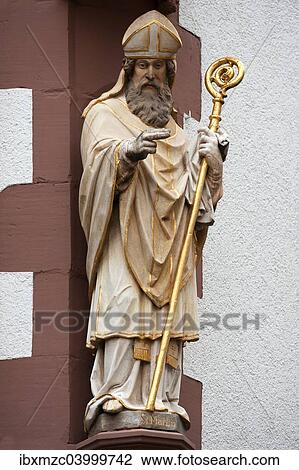 Stock Image - "Sculpture of the Saint Martin at a corner house, Freiburg, Baden-Wurttemberg, Germany, Europe". Fotosearch