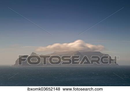 Stock Photo - "Sea and clouds, Mykines Island, Mykines, Faroe Islands, Denmark, Europe". Fotosearch