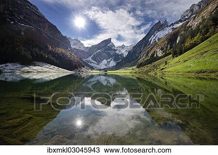 Stock Image - "Seealpsee Lake, with reflections of Mt Saentis, Schwende, Appenzeller Alpen, Canton of Appenzell Innerrhoden, Switzerland, Europe". Fotosearch