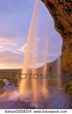 "Seljalandsfoss waterfall in the evening light, Seljalandsfoss, Iceland, Europe" View Large Photo Image Picture - "Seljalandsfoss waterfall in the evening light, Seljalandsfoss, Iceland, Europe". Fotosearch
