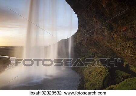 Stock Image - "Seljalandsfoss waterfall, Porsmoerk, South Iceland, Iceland, Europe". Fotosearch