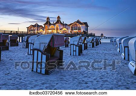 Stock Photograph - "Sellin Pier at dusk, Baltic Seaside Resort Sellin, Rugen, Mecklenburg-Western Pomerania, Germany, Europe". Fotosearch