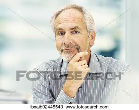 "Senior, friendly, concentrating expression" View Large Photo Image Stock Image - "Senior, friendly, concentrating expression". Fotosearch