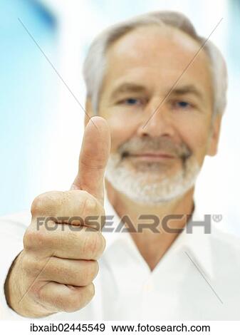 "Senior, successful, confident with a thumbs-up gesture" View Large Photo Image Stock Photo - "Senior, successful, confident with a thumbs-up gesture". Fotosearch