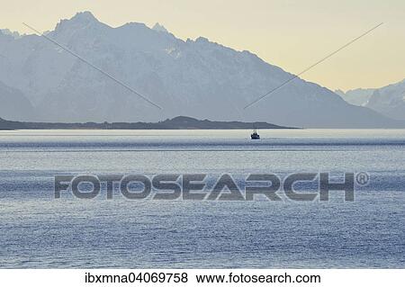 "Ship in the Sortlandsund in front of the mountains, Nordland, Vesteralen, Norway, Europe" View Large Photo Image Stock Photo - "Ship in the Sortlandsund in front of the mountains, Nordland, Vesteralen, Norway, Europe". Fotosearch