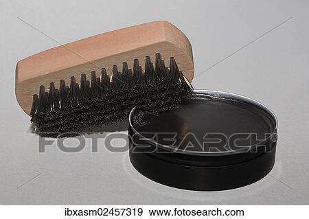Stock Photo - Shoe brush with black shoe polish. Fotosearch