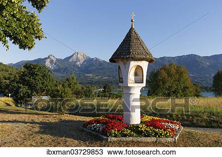 Stock Image - "Shrine in Egg, Mittagskogel Mountain in Karawanken at the rear, Villach, Carinthia, Austria, Europe". Fotosearch