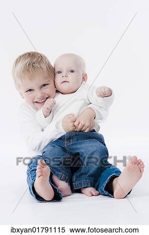 "Siblings, brother with his little sister" View Large Photo Image Stock Photography - "Siblings, brother with his little sister". Fotosearch
