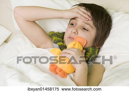 Sick boy in bed View Large Photo Image Stock Photography - Sick boy in bed. Fotosearch