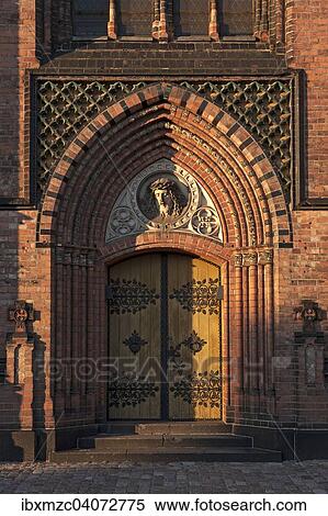 "Side entrance of the neo-Gothic St. Paul's Church, built 1863-1869, with a relief of Christ, Schwerin, Mecklenburg-Western Pomerania, Germany, Europe" View Large Photo Image Stock Photography - "Side entrance of the neo-Gothic St. Paul's Church, built 1863-1869, with a relief of Christ, Schwerin, Mecklenburg-Western Pomerania, Germany, Europe". Fotosearch