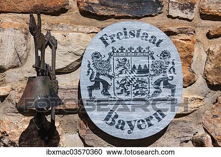 "Sign """"Freistaat Bayern"""", English for """"Free State of Bavaria"""" with a bell on a natural stone wall, Namibia, Africa" View Large Photo Image Stock Image - "Sign """"Freistaat Bayern"""", English for """"Free State of Bavaria"""" with a bell on a natural stone wall, Namibia, Africa". Fotosearch