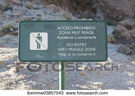 Stock Image - "Sign in Spanish and English, """"No entry, very fragile zone, help us to preserve it, """" Llano de Uruanca plateau, Parque Nacional de las Canadas del Teide, Teide National Park, UNESCO World Heritage Site, Tenerife, Canary Islands, Spain, Europe". Fotosearch
