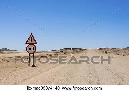 Stock Image - "Sign, speed limit on a dirt road, Namibia, Africa". Fotosearch