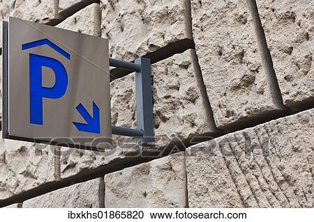 Stock Image - Sign to the entrance of a parking garage. Fotosearch