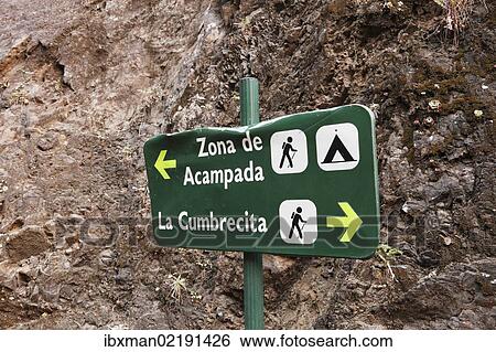 Stock Photograph - "Signpost bent by rockfall, Caldera de Taburiente National Park, La Palma, Canary Islands, Spain, Europe". Fotosearch