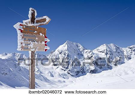 "Signpost on Madritschjoch ridge, Sulden in winter, Monte Zebru mountain and Koenigsspitze mountain at the back, province of Bolzano-Bozen, Italy, Europe" View Large Photo Image Stock Image - "Signpost on Madritschjoch ridge, Sulden in winter, Monte Zebru mountain and Koenigsspitze mountain at the back, province of Bolzano-Bozen, Italy, Europe". Fotosearch